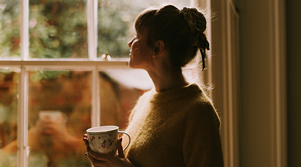 Woman looking out the window